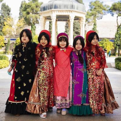 image of Beautiful Ghashghaei girls with traditional clodth in Hafez tomb of Shiraz Iran